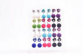 PAck 12 aritos felpa con flor (1).jpg